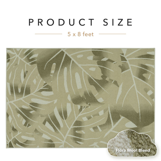 Textile with leaf pattern and product size information on a white background