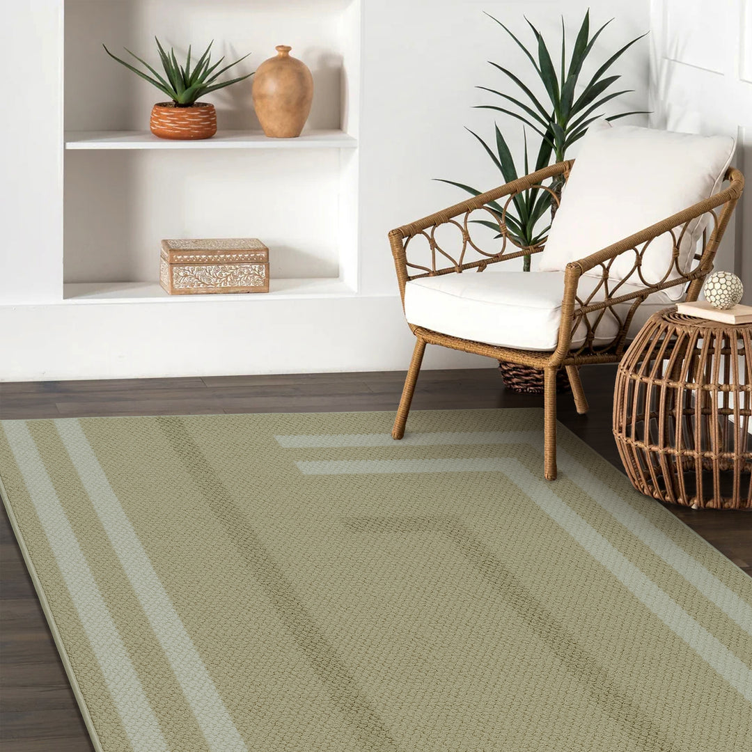 GoDear Design Living room with a green striped rug, wooden chair, and decorative items.