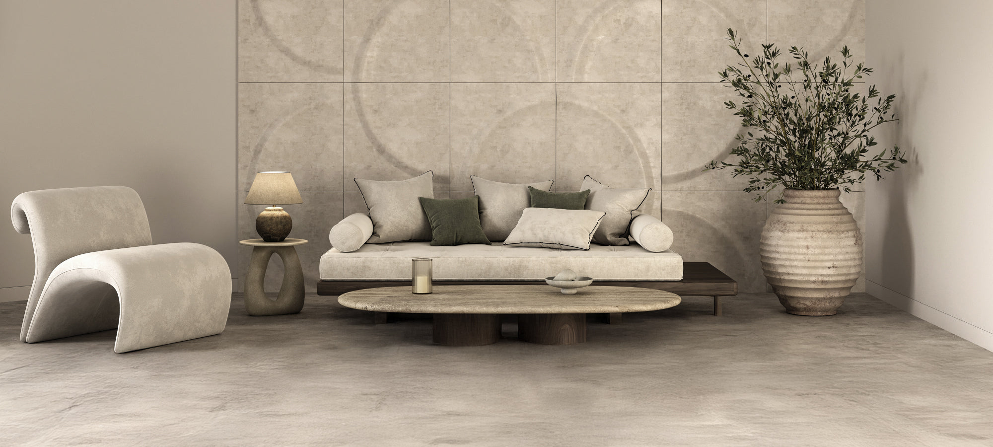 Modern living room with a sofa, armchair, coffee table, and decorative elements.