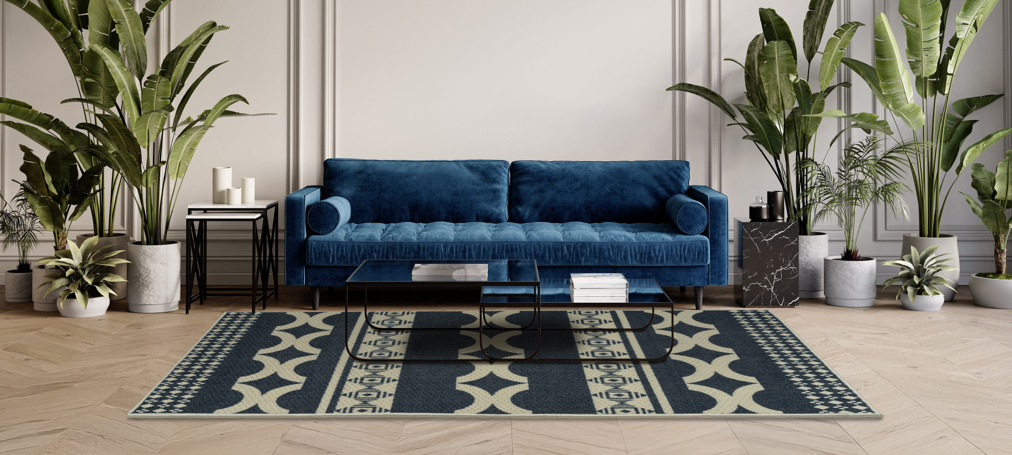 Living room with blue sofa and glass coffee table, transformed by the addition of the Indigenous area rug, which enhances the room’s style and softens acoustics.