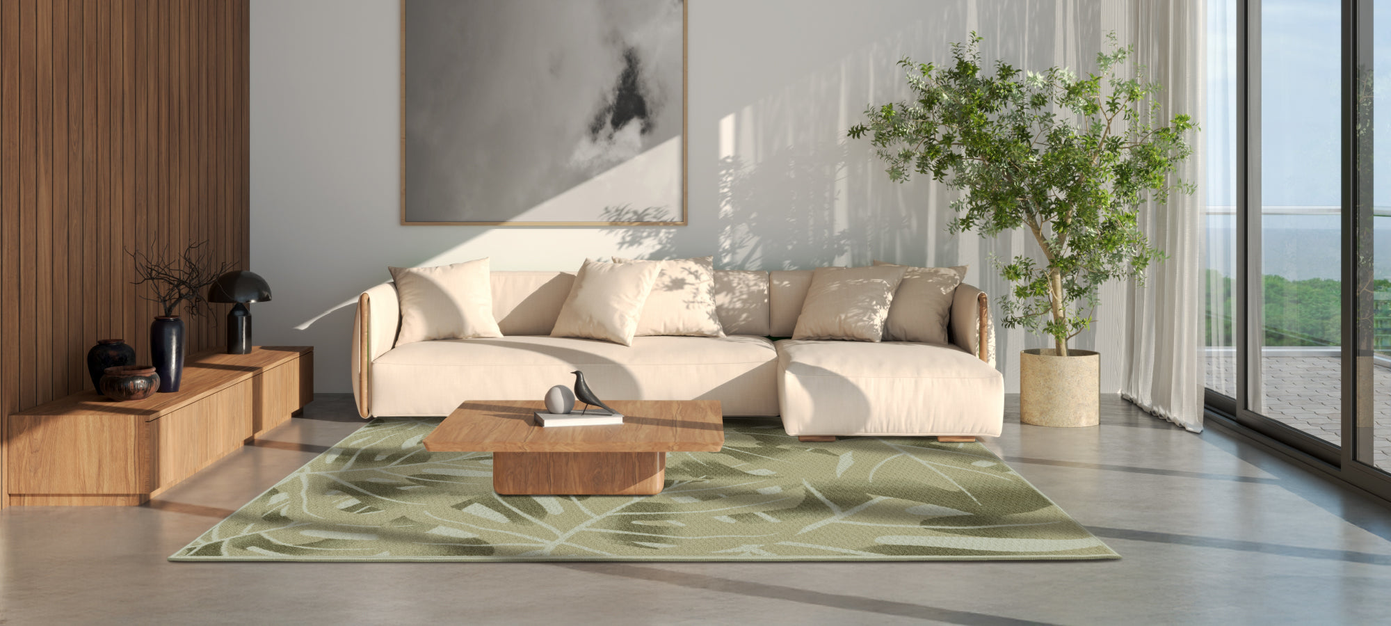 The Palm Fronds area rug, featuring a subtle green leaf pattern, placed in a bright living room with white seating, wood accents, and large glass doors overlooking the mountains, creating a grounded and nature-inspired atmosphere.