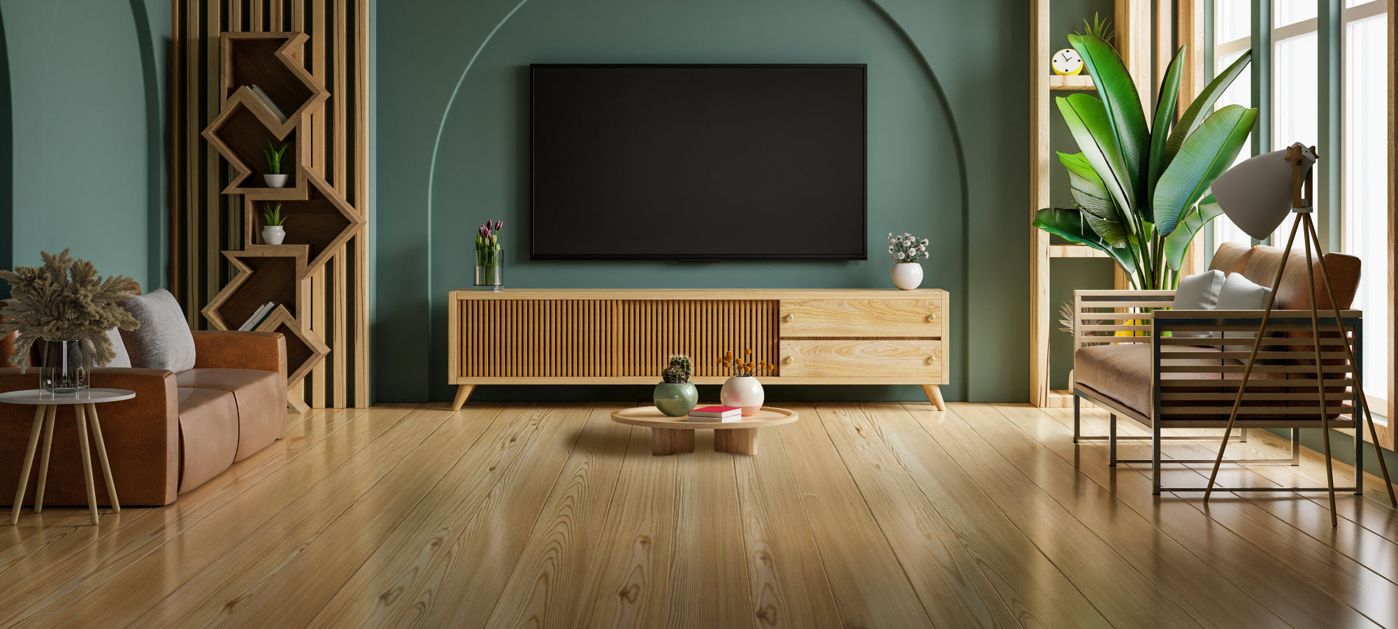Modern living room with wooden furniture, TV, and decorative plants.