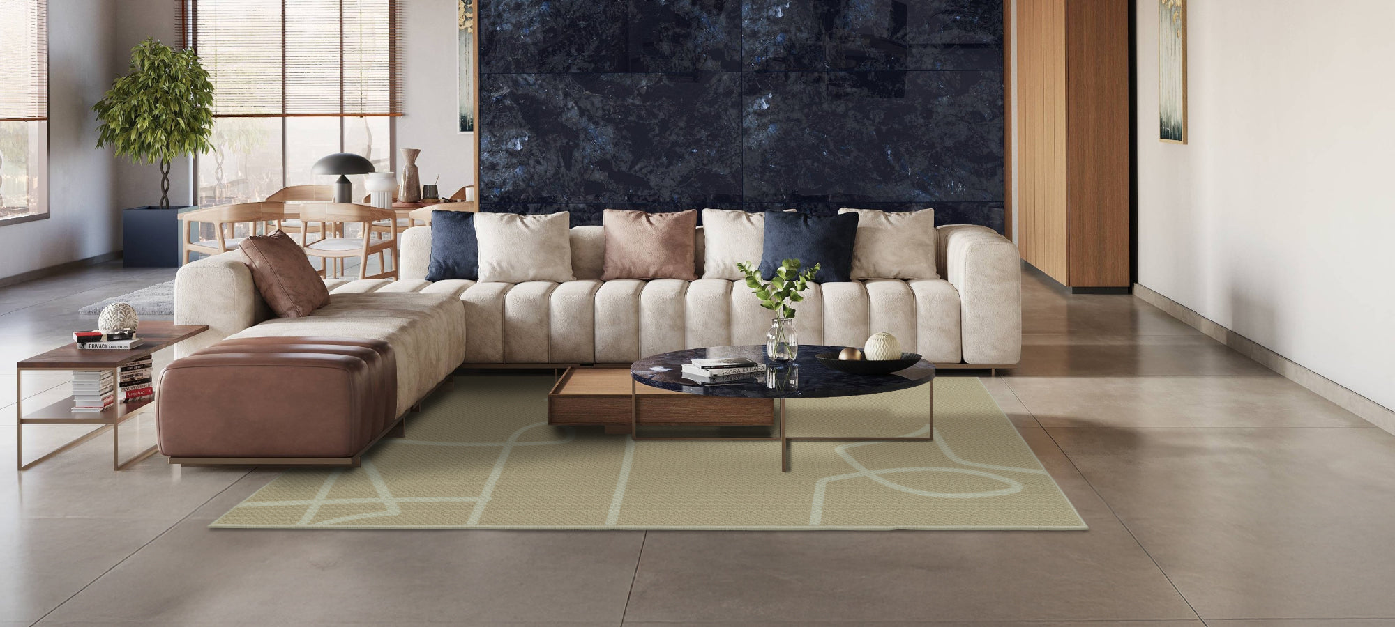 Modern living room with a large sectional sofa, coffee table, and decorative items.