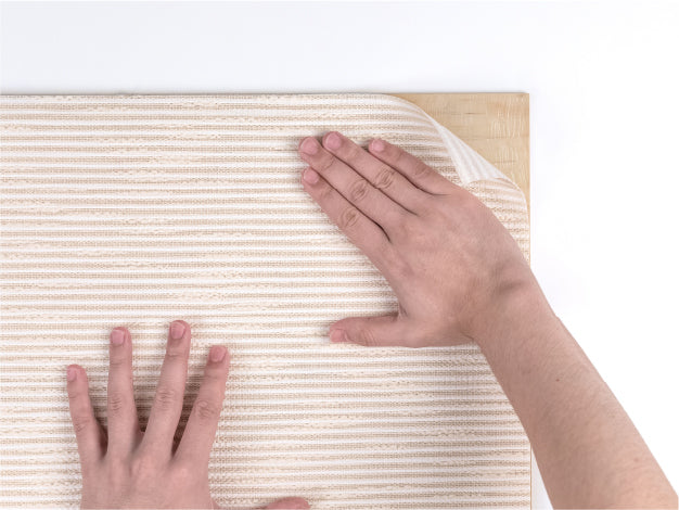attach and smooth the fabric