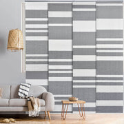 gray and white panel track blinds